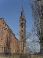 brick church with a tower in Teplice