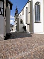 city church on a narrow street in Zofingen