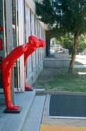 red welcoming statue