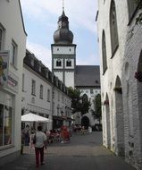 narrow city street to church