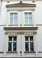 white facade of the building in Bydgoszcz