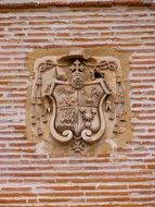 Coat of arms icon on a wall