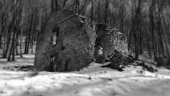 black and white photo of a ruined building in poland