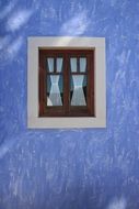 blue wall with window