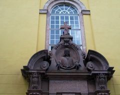 picture of the religious sculpture under the church window