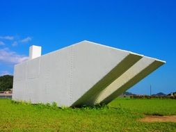 uno port monument on a field