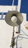 street lamp on a white building close-up