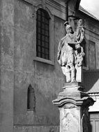 black and white image of a knight statue