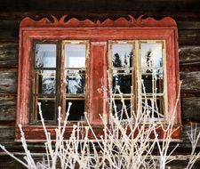 old house with a wooden window as vintage