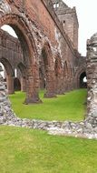 stone ruins of a Gothic church in Scotland