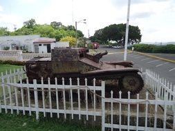 tank behind the fence