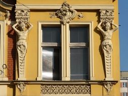 Beautiful bydgoszcz architecture with women figure decorations