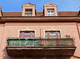 facade of a house with a balcony in bydgoszcz