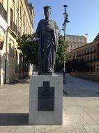 statue of a woman in the street