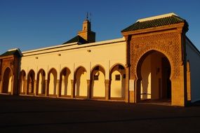 building in sun rays in marrakech
