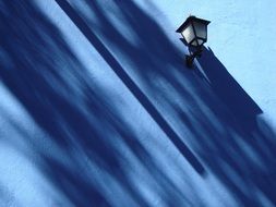 lantern on the blue wall