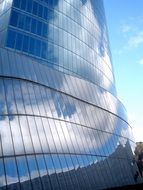 glass facade of iberdrola tower in bilbao