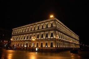 historical corner building on street at night, russia, st petersburg