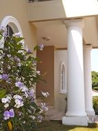 White columns near the entrance to the house