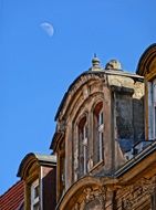 architecture pediment windows relief facade building moon blue sky