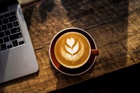 flower on coffee surface latte