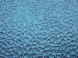 Blue texture of water drops