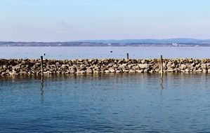 port lake stone wall water