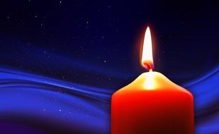 candle that is lit on a blue night sky