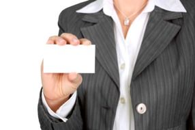 business card in the hands of business lady