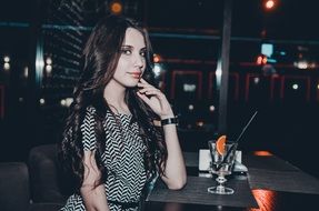 beauty young girl model long hair smile in the bar