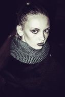 black-and-white photo of the model with evening makeup