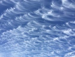 clouds waves plumes sky sweeping