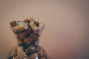 wine corks in a vase