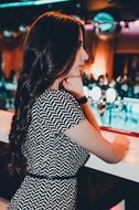 young model at the bar