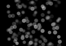 white dots on a black background