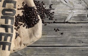 canvas bag and scattered grains of coffee