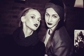 Black and white photo of the models with long hair
