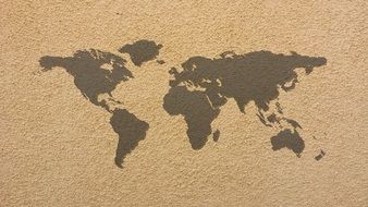world map on a dark beige texture