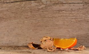 walnut and orange on a wood table