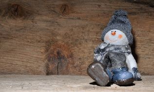 snow man fig peanuts nuts wood