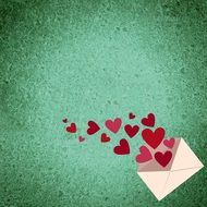 letter with hearts on a green background