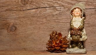 chalk figure and pine cone