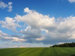 blue sky clouds field landscape