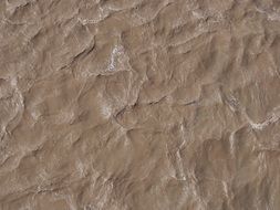 water brown silt ripples waves