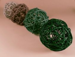 colorful balls on a pink background