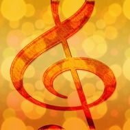 Golden treble clef on a yellow background