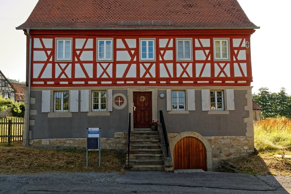 half-timbered farm house near the forest