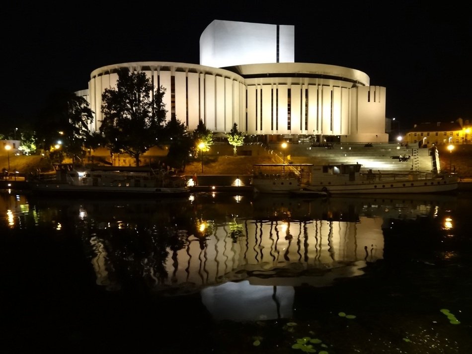 opera house at night in the light of lanterns in poland