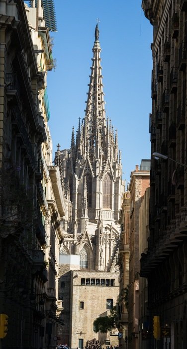 view of the cathedral in the old city in barcelona