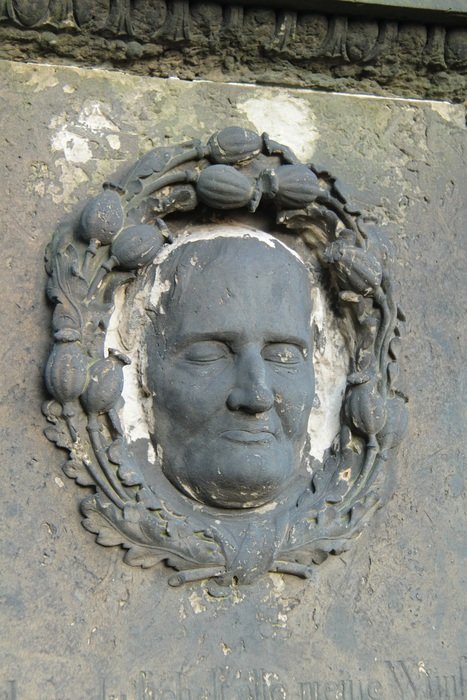 a cast of the face on the monument in the cemetery in Dresden